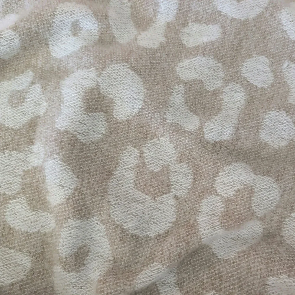 Cozy cheetah print throw. DKNY Pure. 50